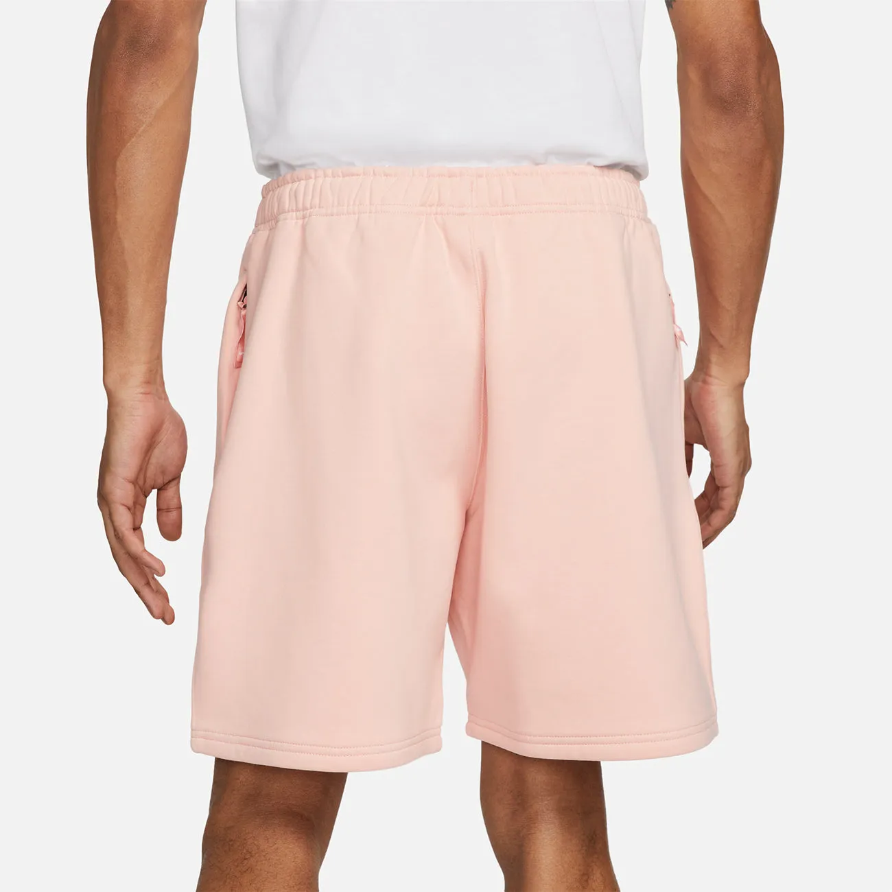 SOLOSWOOSH FLEECE SHORT BLEACHED CORAL WHITE