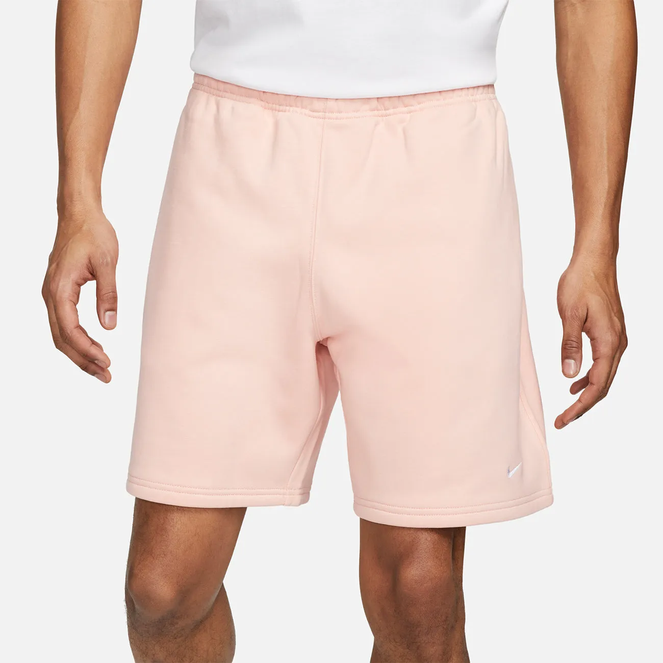 SOLOSWOOSH FLEECE SHORT BLEACHED CORAL WHITE